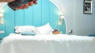 Cute amateur asian web cam girl playing with her toy