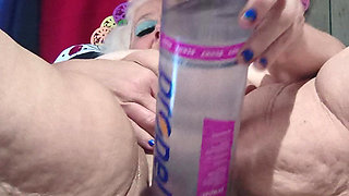 Big Bottle Plugged Clit Cunt