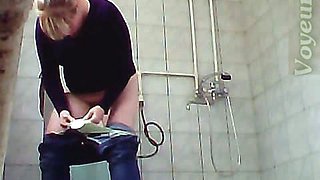Blonde adorable lady in red panties filmed on hidden cam in the toilet