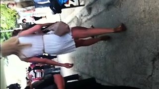 Stunning European teen with sexy legs voyeur upskirt outside