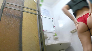 Athletic Girl Pissing in Public Bathroom