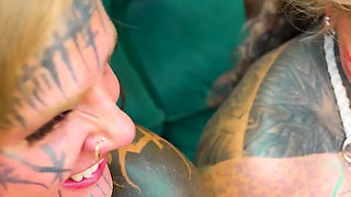 Heavy Tattooed Pornstars in Gangbang with 8 Big Cocks