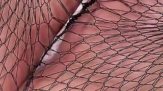 American BBW Scarlett Shows You Her Bountiful Butt Nicely Wrapped in Fishnet Pantyhose