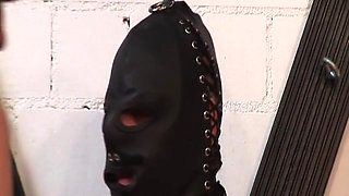 Mature Dominatrix Commands Her Masked Submissive Slave