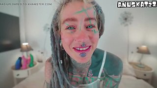 Heavily Tattooed Teen Fucks Herself With Big Dildo