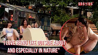 Three German girls walk the shore bare chested