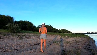 Russian Nudist on the River Shore