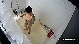 Spying my tattooed girlfriend taking a shower