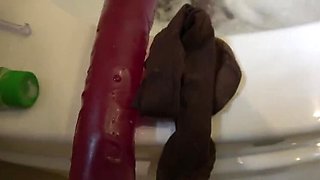 Amateur Wanilianna Shaves Her Hairy Pussy in the Shower While Wearing a Stocking Mask