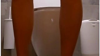 Public Toilet Pissing In Tights And Beautiful Dress