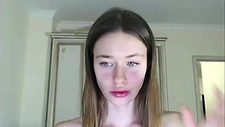 Russian brunette busty camgirl masturbating on webcam