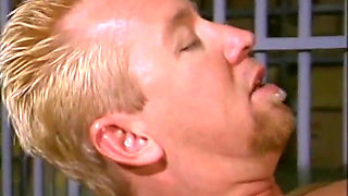 Honey bends over to get banged from the cute blonde guy in the prison