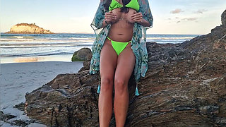 Risky fingering on a public beach