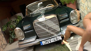 two sluts do it with a cucumber in front of the camera