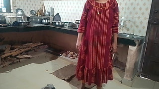 Husband and wife having sex in the kitchen