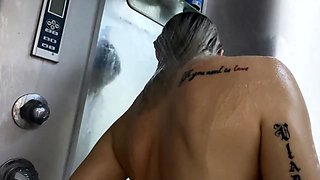 Blonde Babe Pleasures Herself with a Dildo in the Shower