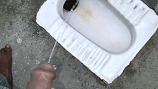 Desi Bhabhi Holding Stepbrother-in-law's Penis and Making Him Pee and Peeing Herself