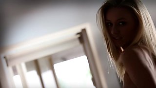 Beautiful blonde babe Natalia Starr masturbates on leather couch