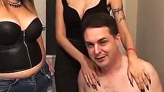 Two Hot Babes Dominate Naked Guy Kneeling in Submission
