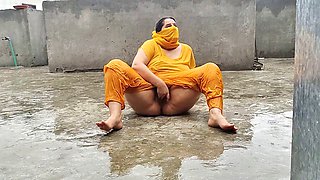 Pakistani mommy savors the rainfall