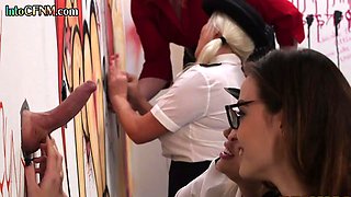 CFNM police officers tugging at a gloryhole