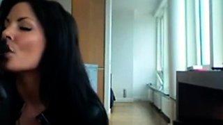 Smoking Hot Brunette Milf in Latex Catsuit and Boots