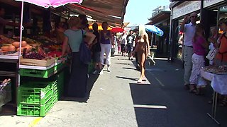 Blonde is flashing her big boobs in the outdoors