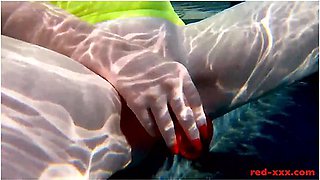 Red Xxx In Fucks Her Pussy With A Toy In The Pool