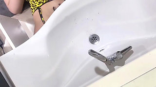 Little Turkish girl her neighbor in the bathroom.