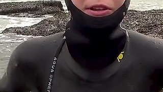Rubbery Beach Encounter: Lucy's Neoprene Pussy Play with Stranger