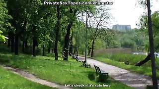 A blossoming meadow and nude couple fucking in the middle