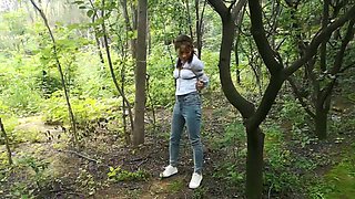 Cute Asian Tied In Forest