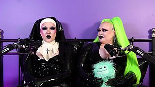 Latex mask lesbian babes have strapon sex