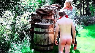 Fostermom humiliating a hunk outdoors .