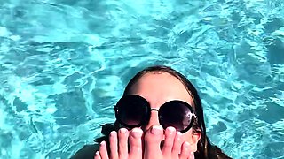 Cute teen girl enjoys foot fetish