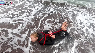 Hogtied in a Wetsuit - Rope Bondage Escape Challenge on the Beach