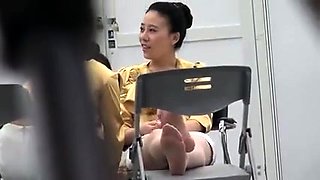 Voyeur spying on a beautiful Japanese lady with sexy feet