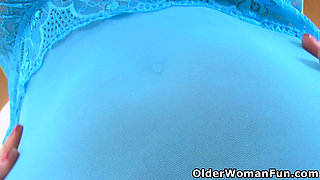 Blonde milf Lucy Gresty looks so hot in black stockings and blue lingerie