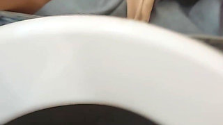 Pissing Woman in the Toilet