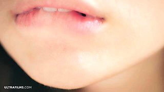 Evelin Elle gets oral in the white bathtub while legs spread under chrome faucet