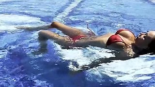 Monika Fox Swims In The Pool In A Red Bikini